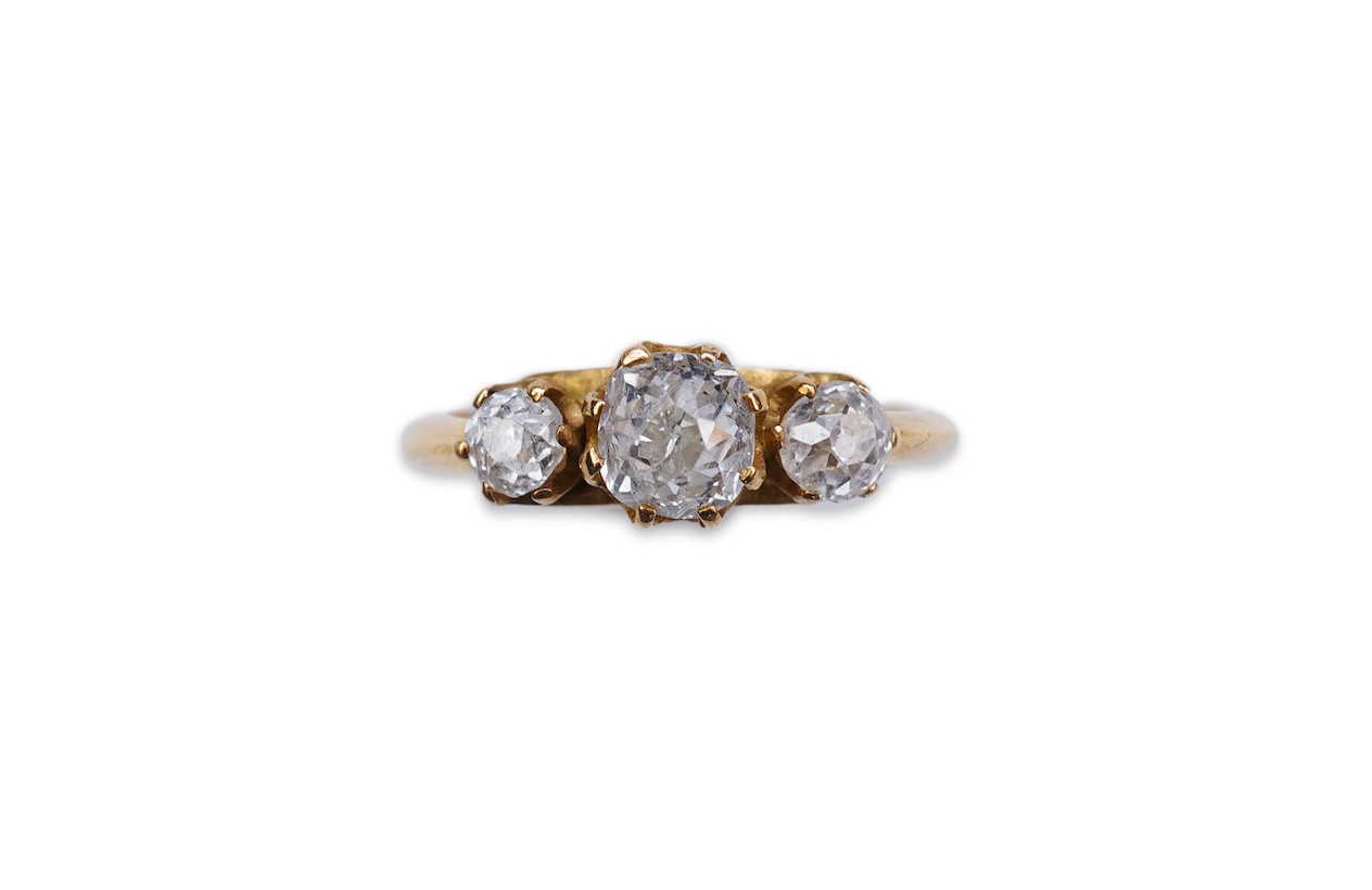 A three-stone diamond ring, early 20th century